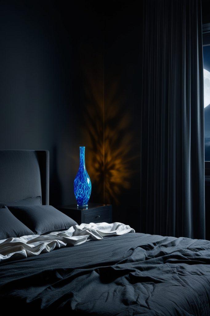 A dark bedroom with a pop of color