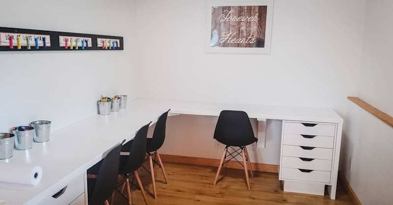 Create one long desk for a wall-to-wall office space.